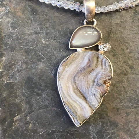 Gray Druzy pendant on hand-woven necklace
