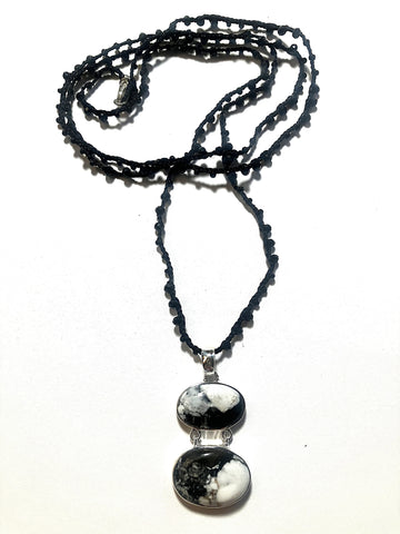 White Buffalo Pendant on Handwoven Black Bead Chain