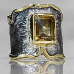 Citrine with oxidized finish and brass band